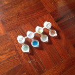 paint by number empty paint pots on floor